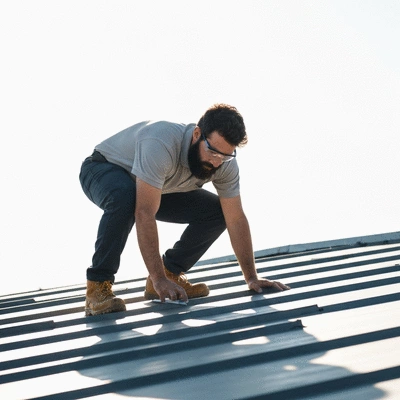 User inspecting a commercial roof